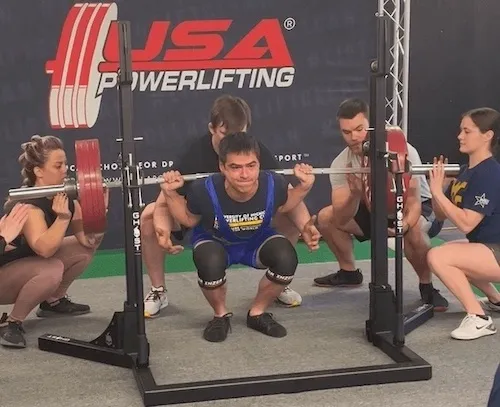 Mark Heimann squatting at a USA Powerlifting meet